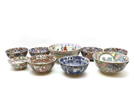 A collection of Chinese porcelain punch bowls, 20th century, all decorated with figures or flowers, 20.7 - 35cm diameter (9) 