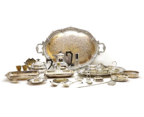 A Garrard &amp; Co silver plated tea service,comprising a twin-handled tray, with scrolled foliate decoration, 76cm wide, a h