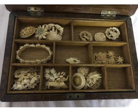 A birdseye maple box with ivory jewellery from the 1920s and 30s