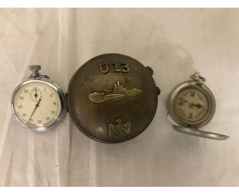 A military stopwatch and compass