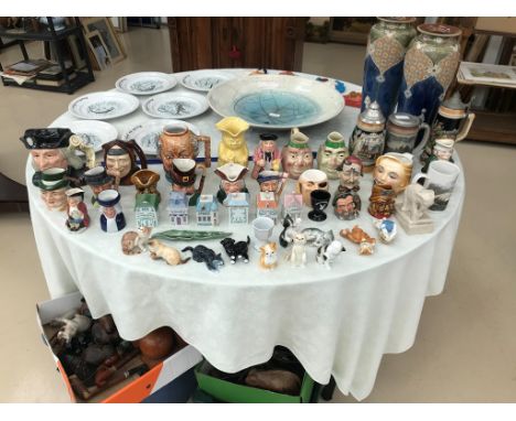 A quantity of ceramic animals, steins etc.