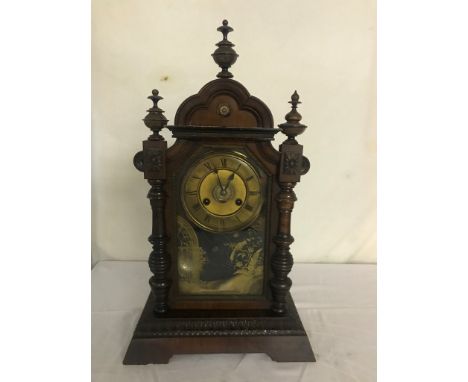 A 19th century alarm mantel clock