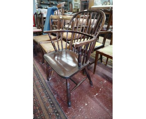 Antique stick back elbow chair 