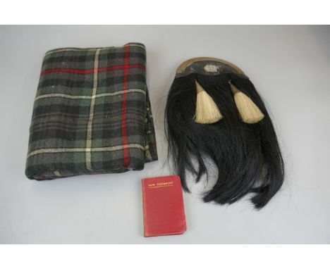 Kilt material, sporran (one tassel missing) copy of The New Testament with inscription which belonged to Thomas Harold Davy C
