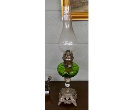Oil lamp with green glass reservoir 