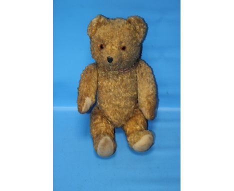 AN VINTAGE STRAW FILLED TEDDY BEAR