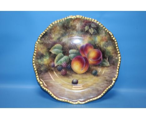 A ROYAL WORCESTER CIRCULAR PLATE with hand painted fruit design, signed J. Skerrett, D approx. 26 cm