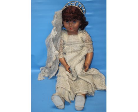 A VINTAGE DOLL