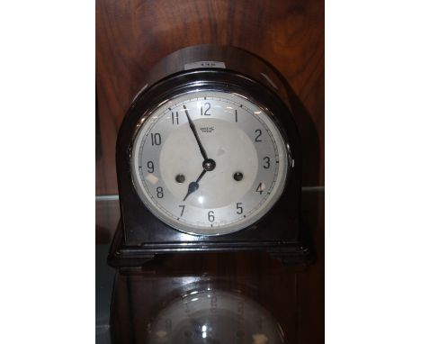 A SMITHS BAKELITE MANTEL CLOCK WITH KEY