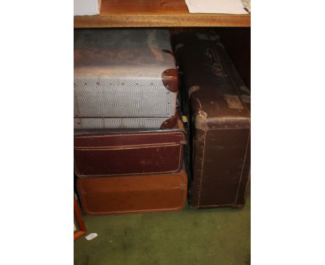 FOUR VINTAGE SUITCASES