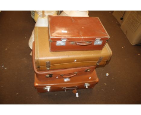 FOUR VINTAGE SUITCASES