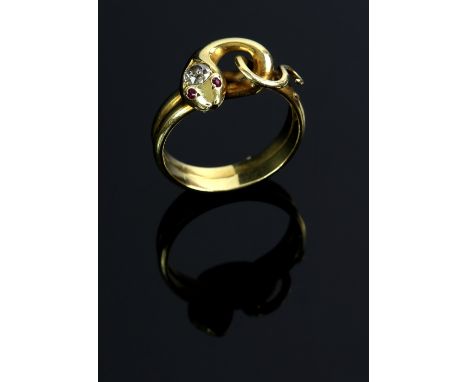 Victorian gold snake ring, the head set with a diamond of 0.25 carats and ruby eyes, in unmarked gold, testing as 15 ct, ring