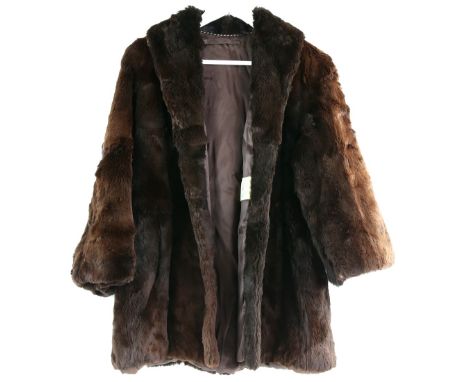 A Martin's of London brown lambs wool jacket, a gold shawl, and vintage clutch bags.     