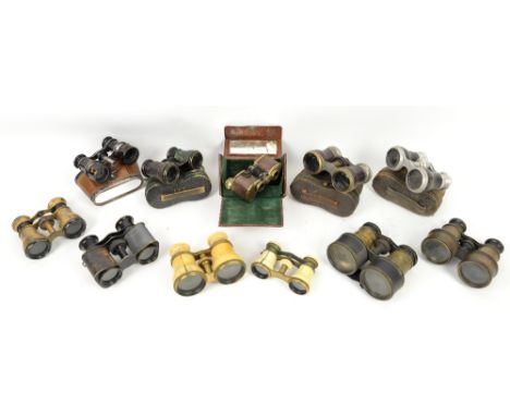 Group of opera glasses and cases including pairs mounted with tortoiseshell, leather and a gilt-metal example with notice rea