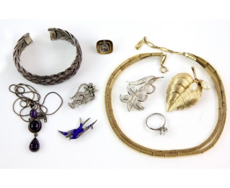 A bag of costume jewellery, including Tiffany &amp; Co Seabourn Cruise Line lapel pin, in 18 ct and silver set with a blue sa