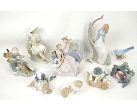 Lladro figural group 5486 Debutantes, Lladro figural group two poodles and a ball, and various Nao figurines (9 in lot).     