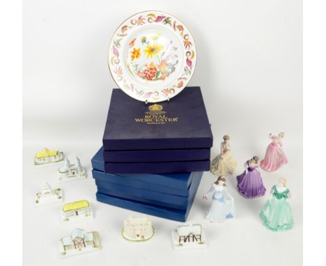 Coalport houses x 7, Coalport Valentine Lady figurines  x 5,  and 8 Royal Worcester collectors plates individually boxed .   