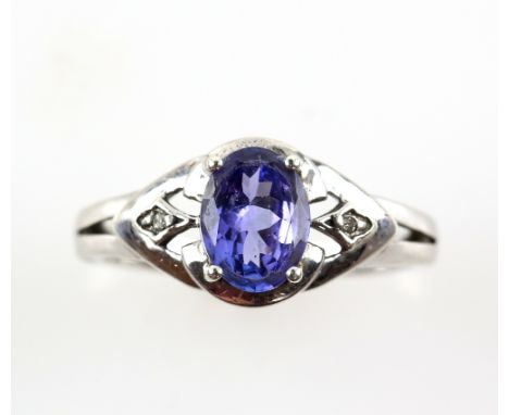 Tanzanite ring with small diamonds in the shoulders, marquise shaped setting, white gold, 9 ct Birmingham hallmarks, ring siz