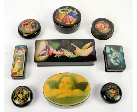 Seven hand painted Russian lacquer boxes, decorative scenes including boy with swan, dancing girls, five signed; together wit