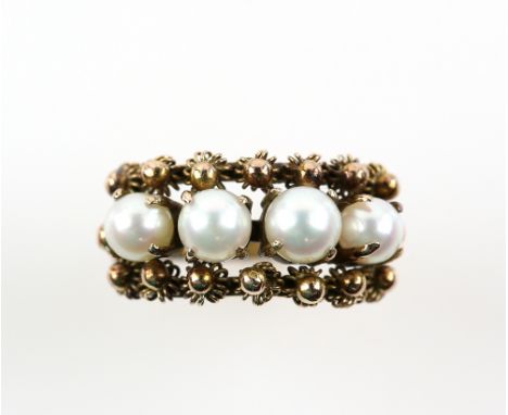Antique Italian pearl ring, set with four white pearls, each 4mm in diameter, bordered by cannetille filigree work, mount tes