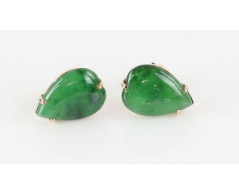 A pair of nephrite jade earrings, pear cabochon cut jade, claw set in gold stamped 14 ct, post and butterfly fittings 1.6 x 1