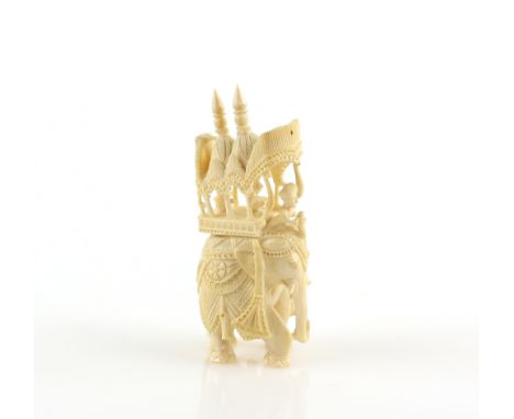 An Anglo-Indian, Bengali ivory chess piece, about 10 cm high, 19th Century; together with a pair of famille rose plates, 18.5