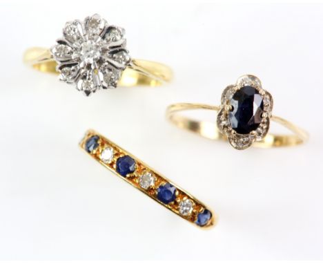 Three rings, a diamond cluster, size L, sapphire and diamond half eternity, size K, both mounted in 18 ct and sapphire cluste