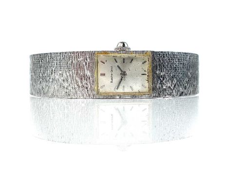 A Bueche-Girod 9ct white gold ladies manual wind bracelet wristwatch, the 13mm rectangular silvered dial signed and with silv