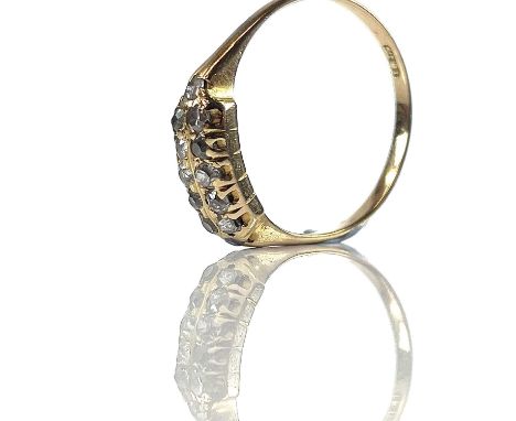 A Victorian 18ct diamond ten stone cluster ring with two rows of small old cut diamonds, size N/O, weight 2.4g.