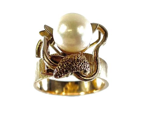 A 14ct gold single pearl set ring, of foliate open work applied design, the shank with textured finish, size M, weight 8.54g.