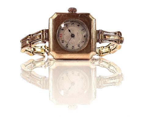 An early 20th century 9ct mid size manual wind wristwatch, the 28mm silvered dial with Arabic numerals, the square case with 