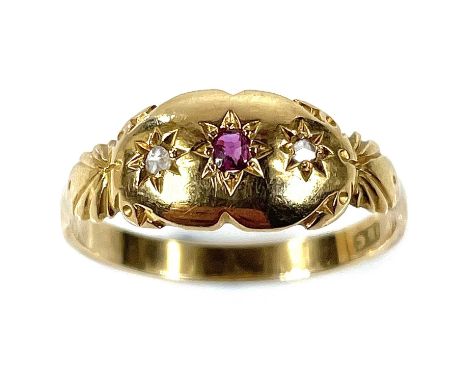 An Edwardian 18ct gold diamond and ruby three stone ring, size N/O, weight 2.41g.