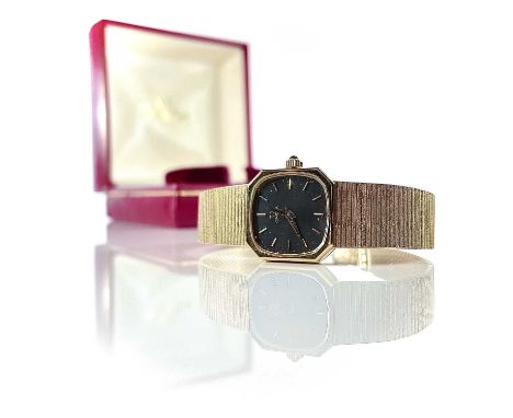 An Omega 9ct ladies manual wind bracelet wristwatch, ref. 625, the signed black 18mm dial with gilt baton markers, the 17 jew