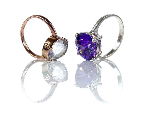 A 9ct rose gold white stone set dress ring, size K, weight 2.6g; together with a 925 silver amethyst ring (2)  