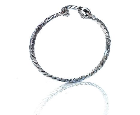 A 999 fine silver Newlyn Rope bangle by James Suddaby, stamped signature and 999FS, weight 25.39g.James Darrall Suddabyarrive