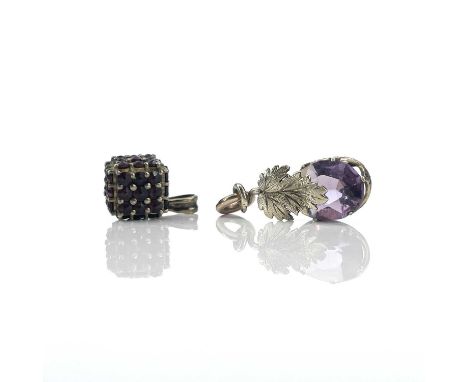 A 9ct gold garnet set cube pendant, length 20mm; together with a gold set amethyst pendant, weight 6g (2)