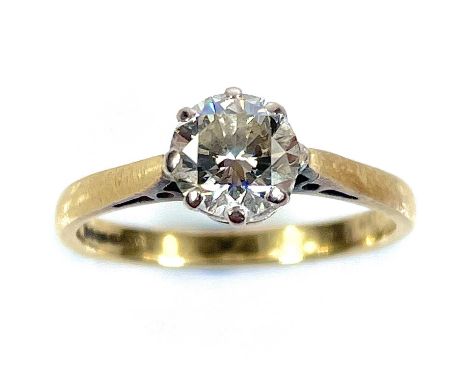 An 18ct gold diamond solitaire ring, the round cut diamond measuring 0.70ct, London 1988, size I/J, weight 2.5g.