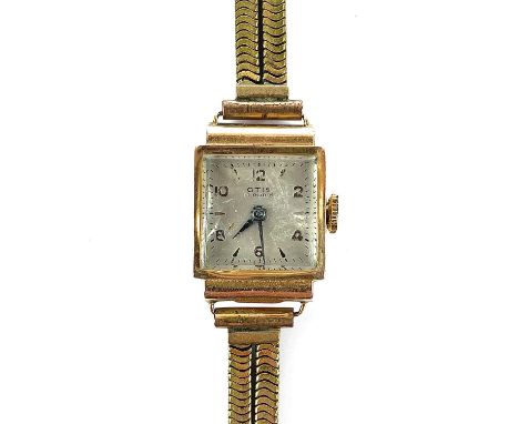 An18ct ladies manual wind wristwatch on gold plated bracelet, the dial signed OTIS.