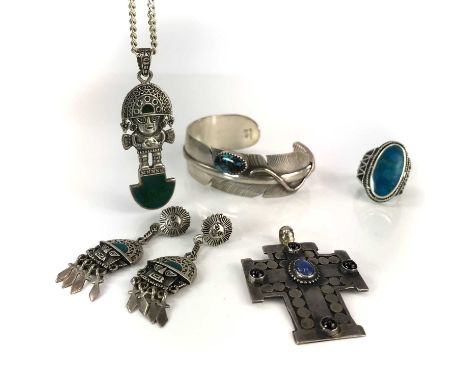 A collection of 925 silver Peruvian jewellery, including a turquoise set feather bangle, a stone set cross pendant, a turquoi