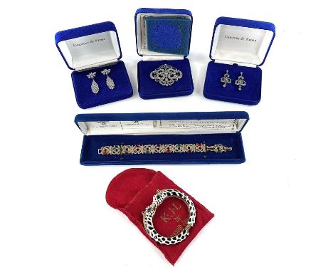 Four boxed Camrose &amp; Kross Jackie Kennedy inspired costume jewellery items with certificates; together with a giraffe des