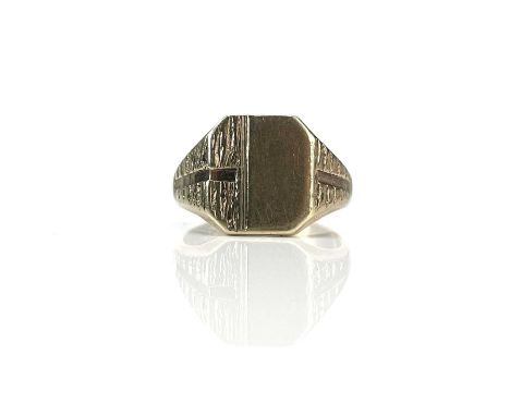A 9ct hallmarked gentleman's signet ring with half textured design, Birmingham 1970, size P/Q, weight 6.63g.