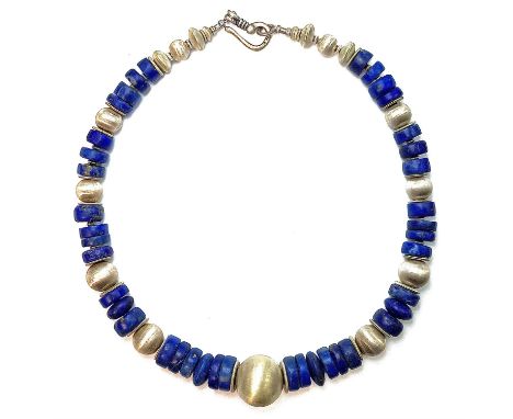 A contemporary lapis lazuli and silver bead necklace by Jane Dale, length 43cm, together with certificate and purchase receip