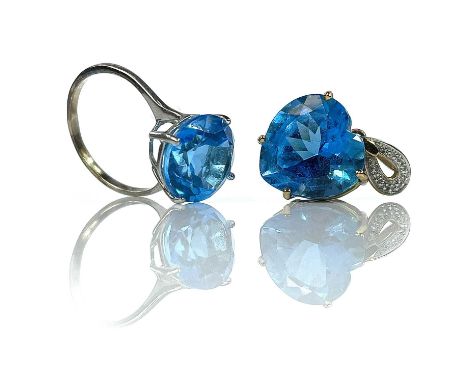 A 9ct blue topaz dress ring, measuring 6ct approximately, size O; together with a topaz heart pendant, the loop set with tiny