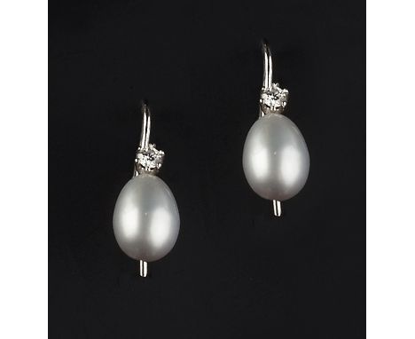 A PAIR OF DIAMOND AND CULTURED PEARL EARRINGS, each pear-shaped cultured pearl drop of silver-white hue, surmounted by a claw