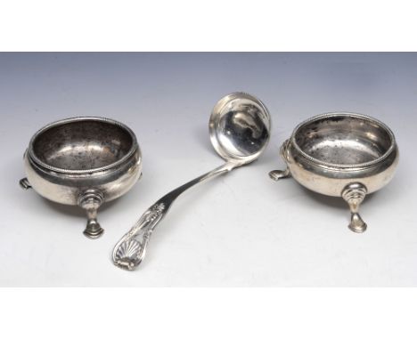 A PAIR OF GEORGE II SILVER BUN SALTS with beaded edge, three cabriole legs and hoof feet, 7.5cm wide, London 1750 and 1753 by