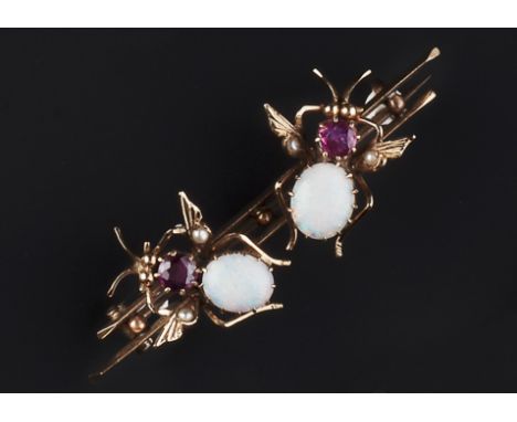 AN OPAL AND RUBY SET INSECT BROOCH, the bifurcated bar mount with bead highlights, applied with two insect panels, each with 