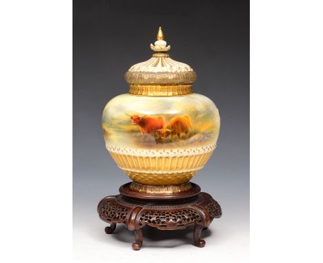 A ROYAL WORCESTER POT POURRI VASE AND COVER, painted with highland cattle in a mountainous landscape by James Stinton, above 
