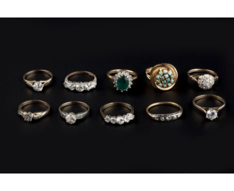 A COLLECTION OF DRESS RINGS, comprising a diamond and white stone half hoop ring (two white stones later replaced), a turquoi