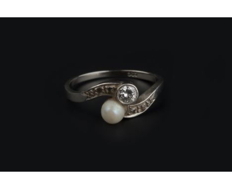 A DIAMOND AND HALF PEARL CROSSOVER RING, millegrain set with brilliant and lasque-cut diamonds, stamped '585', (pearl unteste