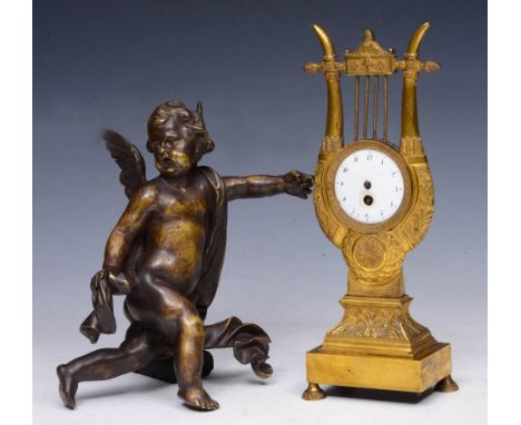 A LATE 18TH CENTURY FRENCH ORMOLU CASED LYRE CLOCK with white enamel dial, 25cm high; together with an Italian bronze archite